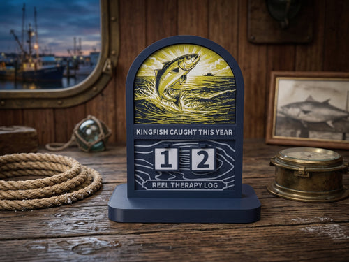 Decorative log with fish illustration and text on a wooden surface with nautical theme